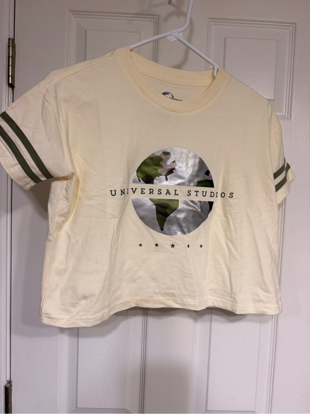 Universal Cream Crop Tee with Green Globe Print